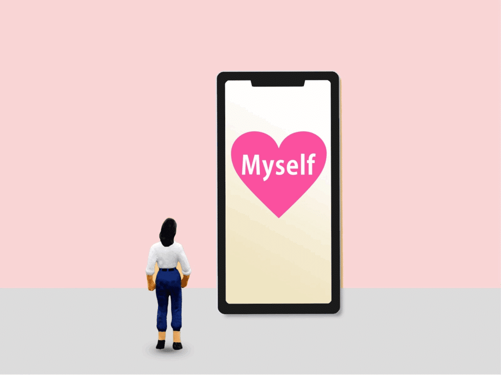 セルフ・コンパッション:大きなスマートフォンの画面にピンク色のハートと「Myself」の文字が表示され、それを女性のフィギュアが見上げているイラスト。