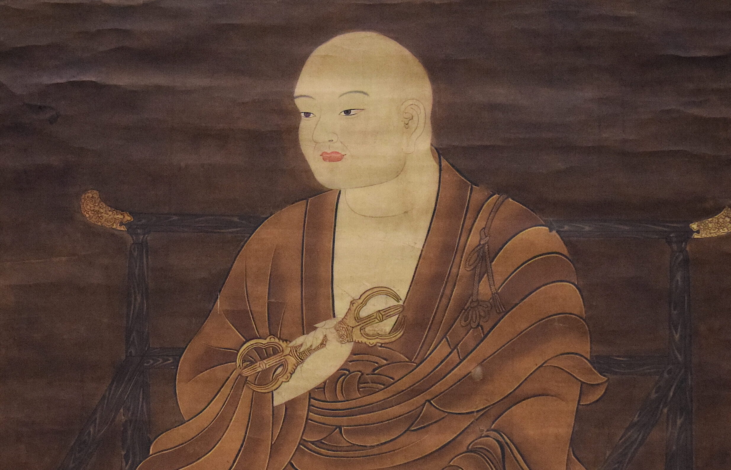 僧衣をまとい座る空海（弘法大師）の日本伝統的な絵画。