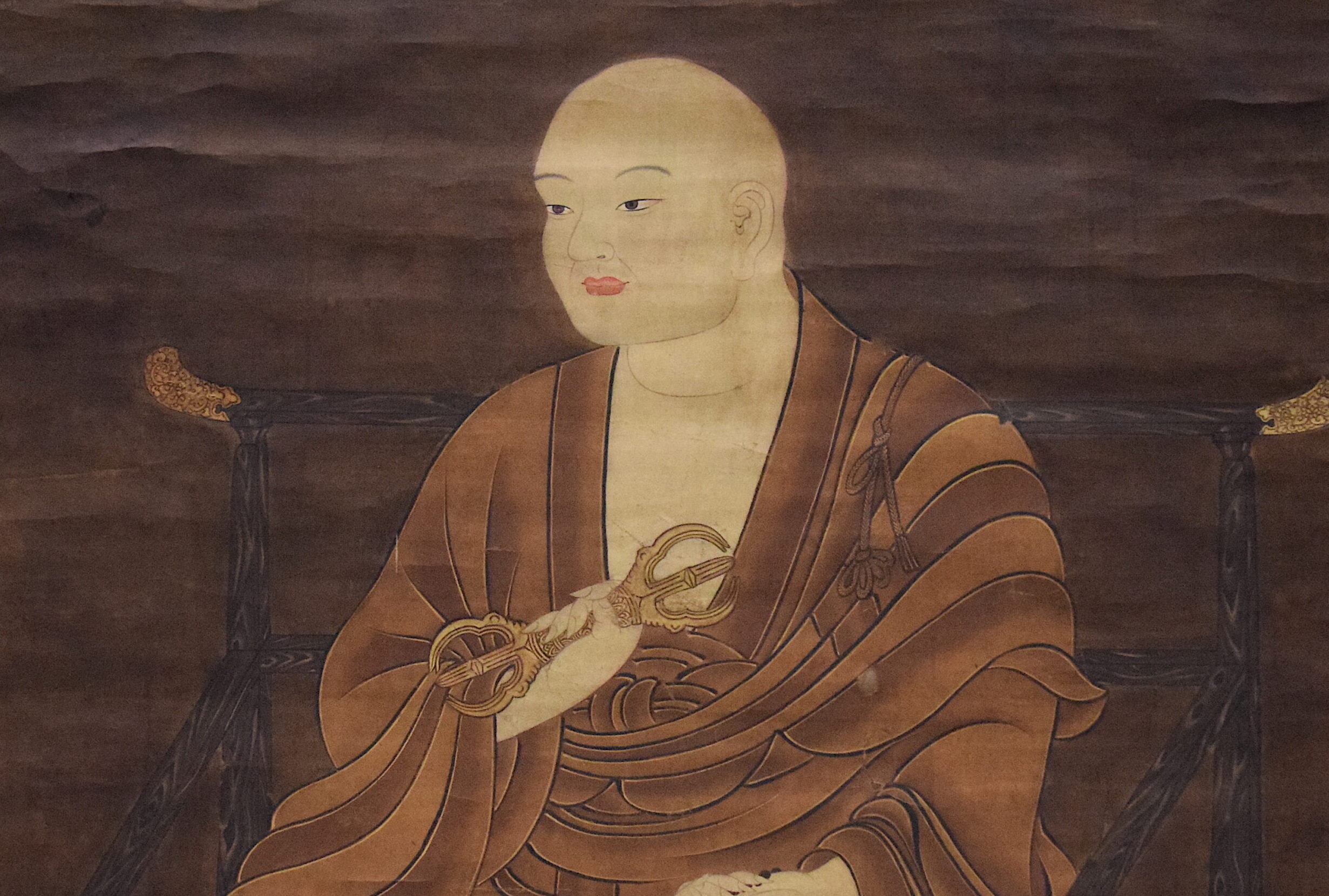 Traditional Japanese painting of Kukai (Kobo Daishi), seated in monk’s robes.