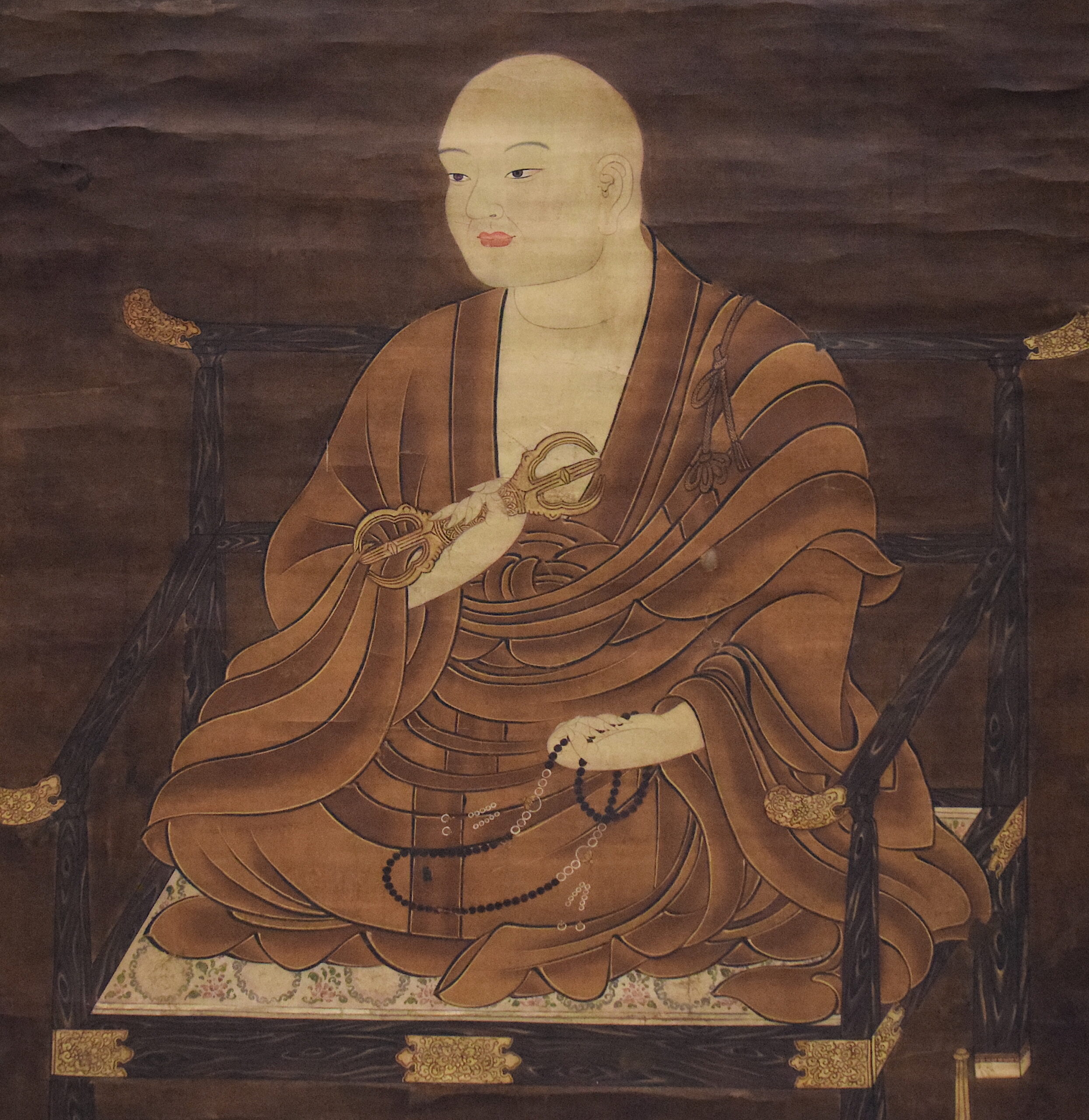 Traditional Japanese painting of Kukai (Kobo Daishi), seated in monk’s robes.
