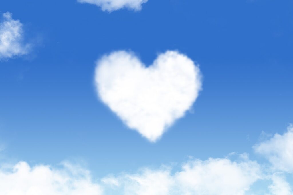 A white heart-shaped cloud floating in the blue sky :Meditation for Anxiety