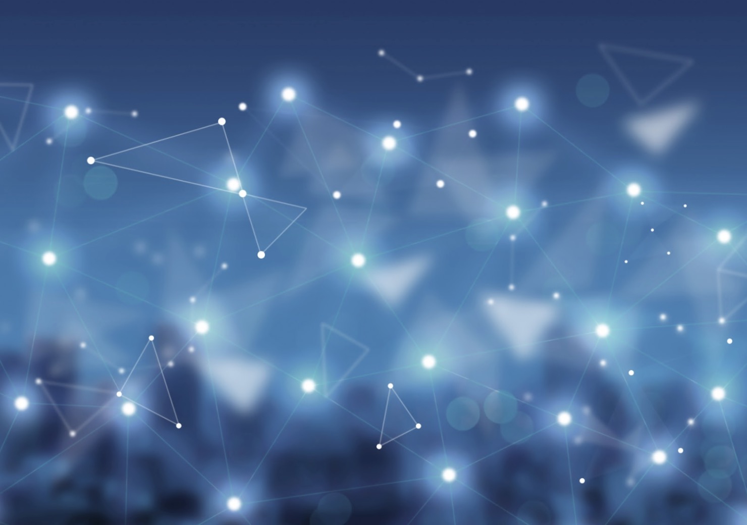 Abstract image of a digital network with glowing white nodes and connecting lines on a blue background, symbolizing technology and communication: Jon Kabat-Zinn